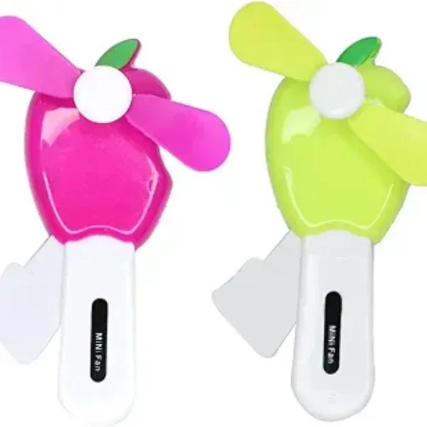 Two small handheld fans, one pink and one green, on a white background.